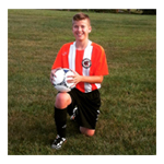 Xavier posing for his 2014 season with travel soccer team Lightning Fury.